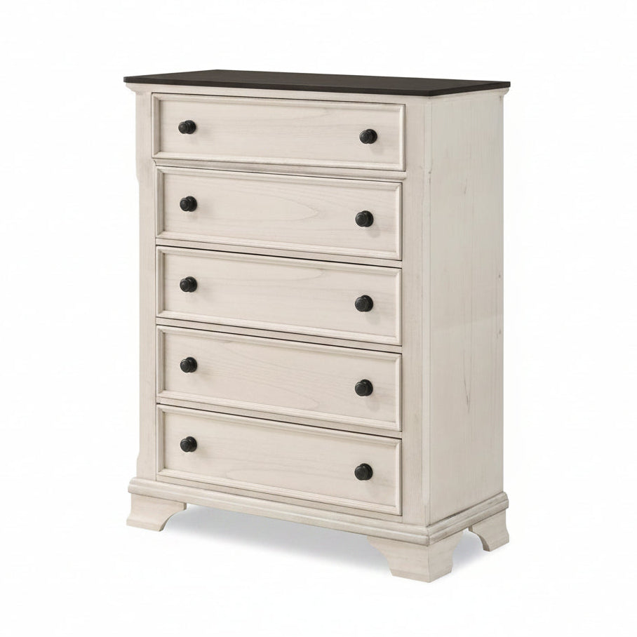 White dresser with black knobs on a white background