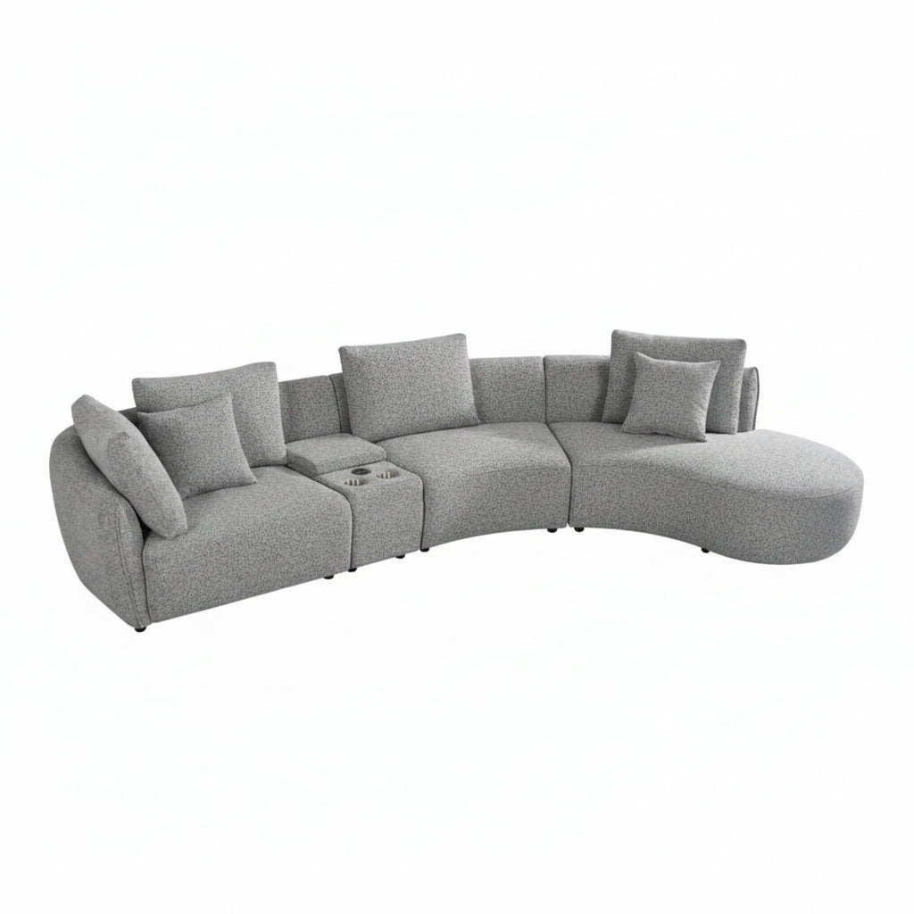 Gray sectional sofa with cushions on a white background