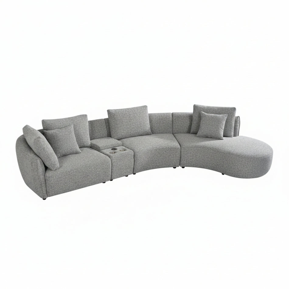 Gray sectional sofa with cushions on a white background