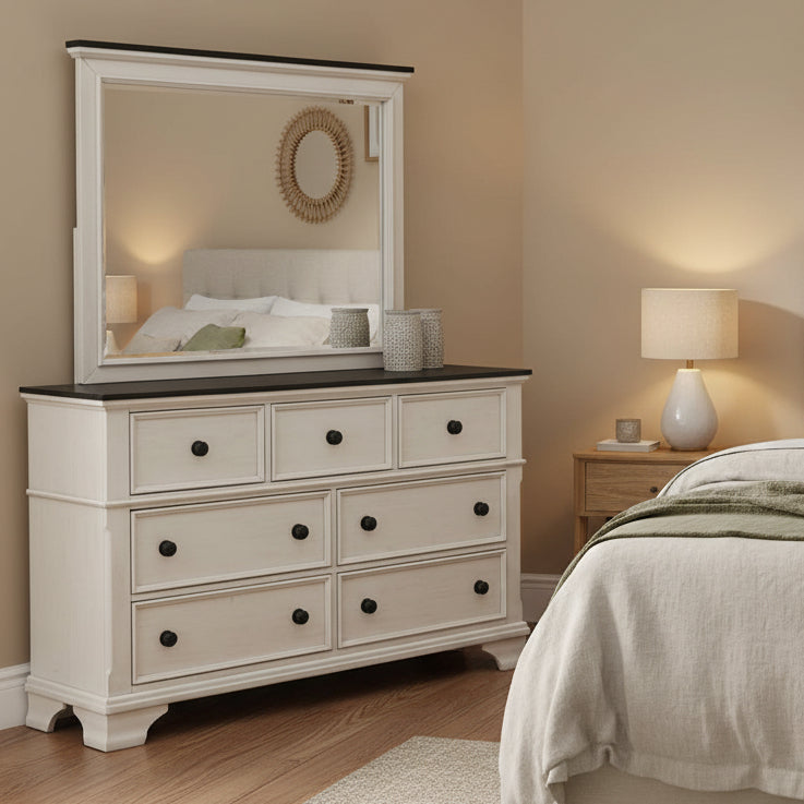 White dresser with mirror on a white background