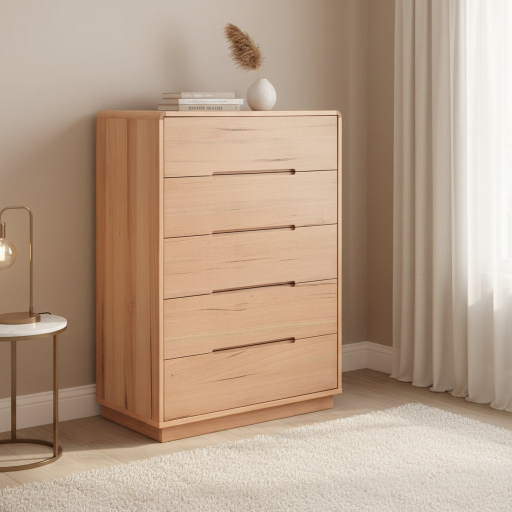 Wooden dresser with four drawers on a white background