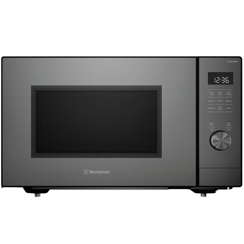 Black microwave oven with digital display on a white background