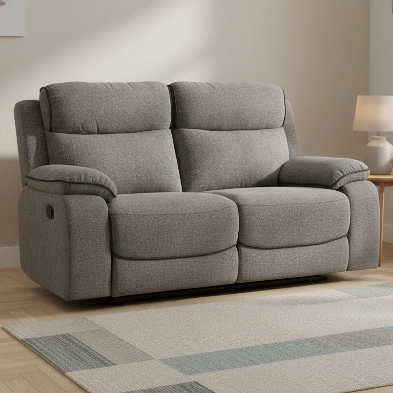 Gray fabric sofa with reclining feature on a white background