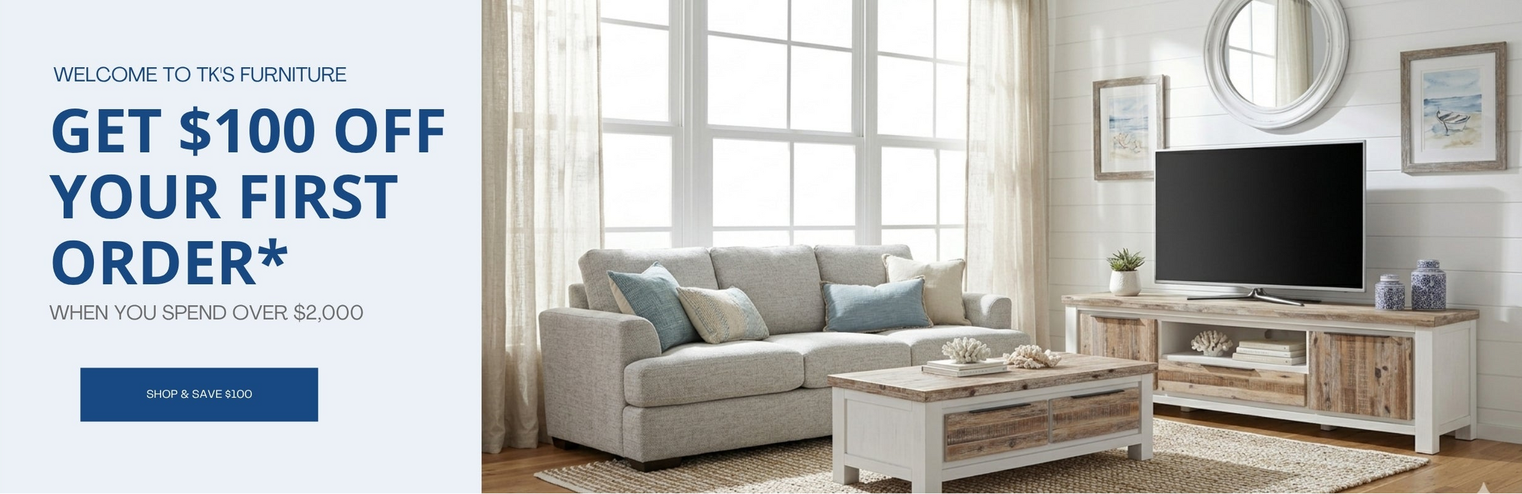 Living room with a sofa, coffee table, and TV stand, featuring a furniture store advertisement on the left.