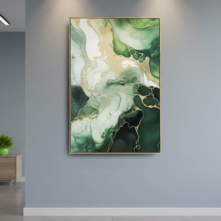 Abstract green and gold painting on a wall in a sunlit room with large windows.
