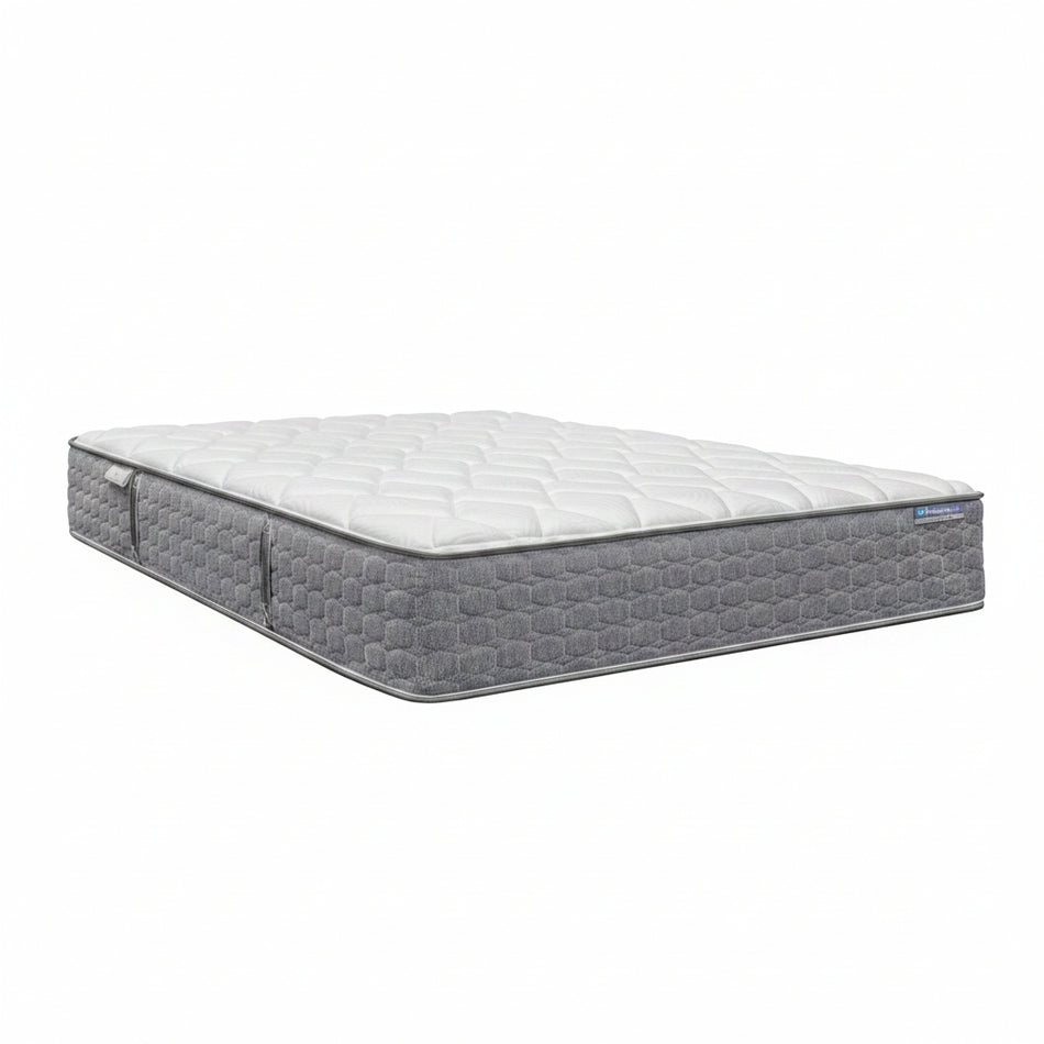 Gray mattress with a white top on a white background