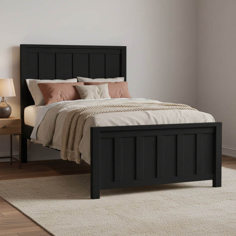 Black wooden bed with bedding on a white background