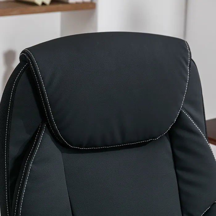 Close-up of a black office chair with white stitching details.