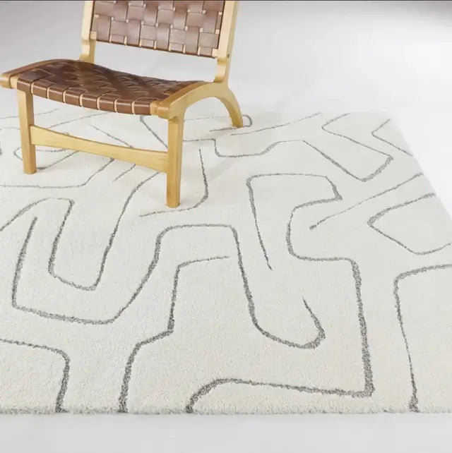 Rug with abstract pattern on a light background