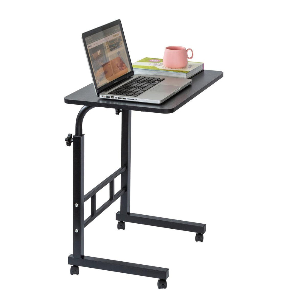 Black adjustable laptop desk with a laptop, mug, and books on a white background