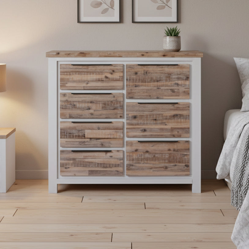 Wooden dresser with a white base on a white background