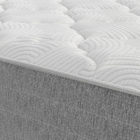 Gray mattress with quilted surface and textured base