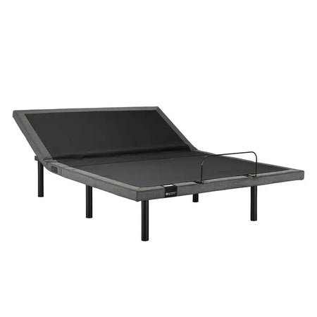 Gray adjustable bed on a white background