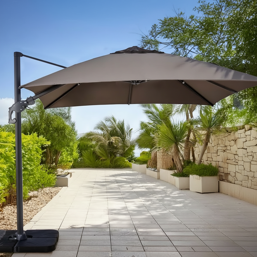 Laredo square cantilever umbrella in an outdoor setting with trees and a clear sky.