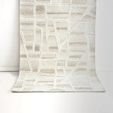 Textured area rug with geometric pattern on a white background