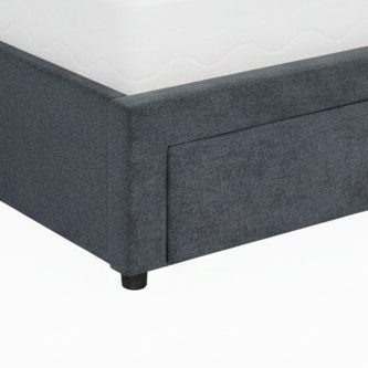 Gray upholstered bed with white mattress on a white background