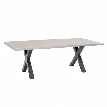 White dining table with X-shaped legs on a white background