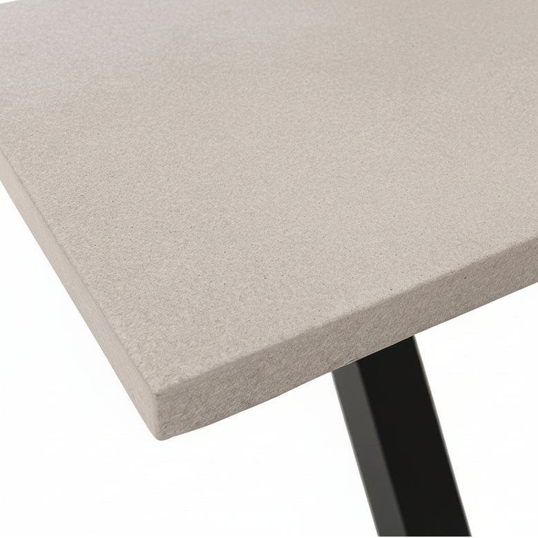 Close-up of a switch outdoor table surface with a black leg on a white background