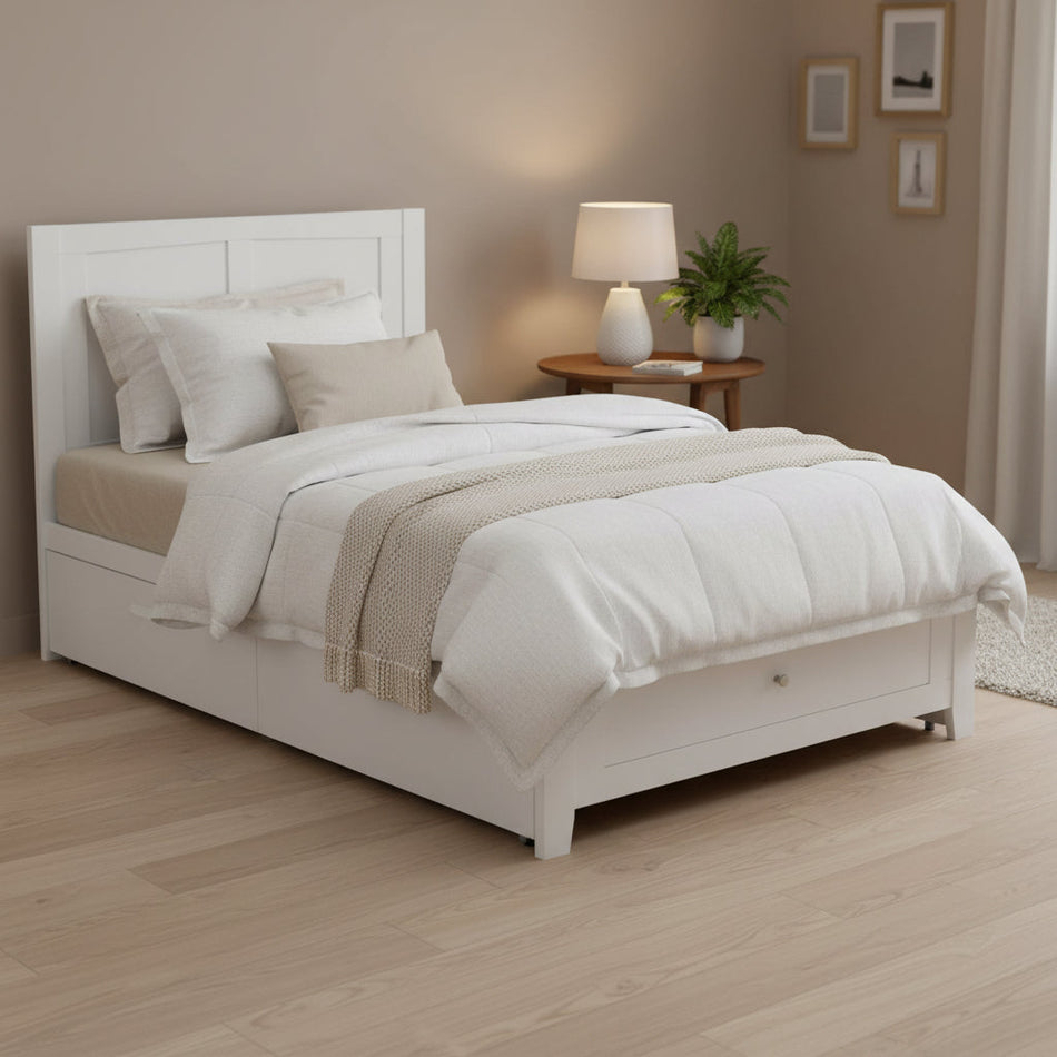 White bed frame with beige mattress and pillow on a white background
