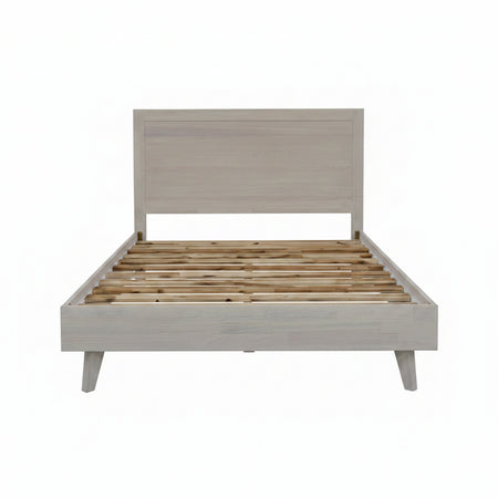 Wooden bed frame with slatted design on a white background