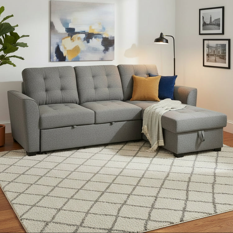 Gray sectional sofa with cushions in a living room setting