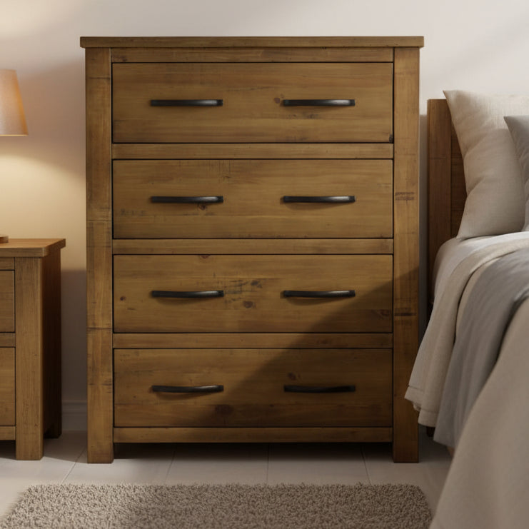 Wooden dresser with four drawers on a white background