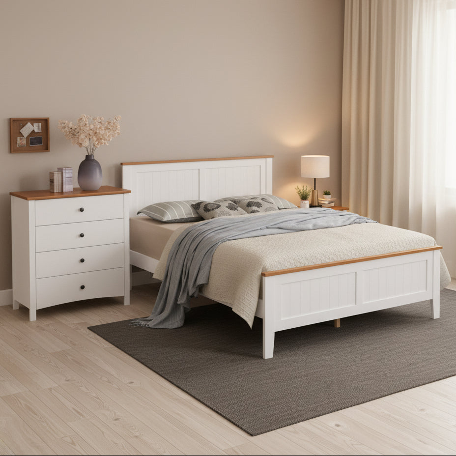 Modern bedroom with a white bed and dresser against a marble wall.
