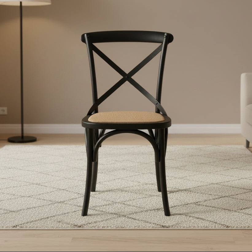 Black wooden chair with a woven seat on a white background